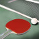 Gewo Rave Action - you can see a bat and a ball positioned on a table tennis table
