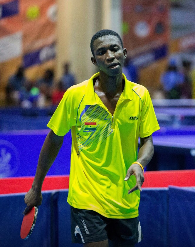 Godwin Aseku playing table tennis